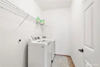 Generous size utility room with new washer and dryer
