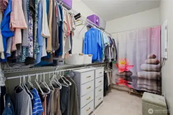 Primary walk-in closet just off of the bathroom