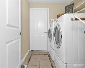 Utility room with shelving above the washer & dryer space.  Washer & Dryer NOT included in the sale. Thanks! Here you also get a close up look at the 6 panel doors.