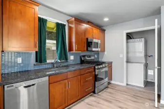 Another view of kitchen and utility room with new washer/dryer.  DADU also has a new gas tankless water heater.