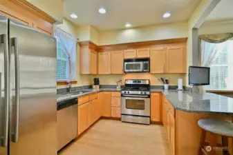 Lots of cabinet and counter space in this large kitchen.