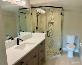 Lavish bath with custom shower and 5'  vanity