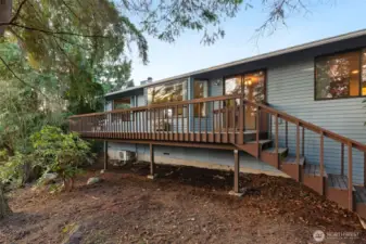 Garden area in back, or room for a picnic table!  Note the heat pump for heating & cooling.