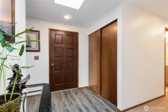 Double closets at entry, and skylight welcomes you in!