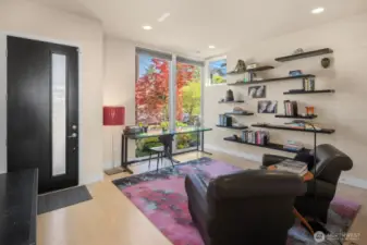 The main floor den is just one of two, fantastic home office spaces with peaceful, arboreal outlooks
