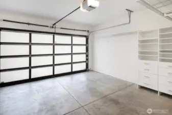 A real 2-car garage includes storage space, above and aside