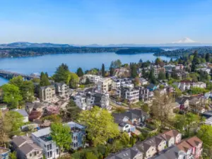 For context, here is a shot of the home as part of this beautiful, quintessential Seattle neighborhood framed by water and mountains.