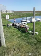 Closer view of the irrigation pump system.