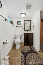 Primary bedroom ensuite 1/2 bath with roughed-in shower