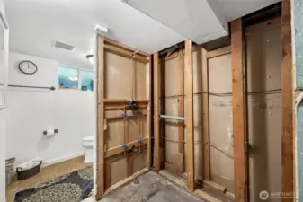 Primary bedroom rough-in for shower/cabinet