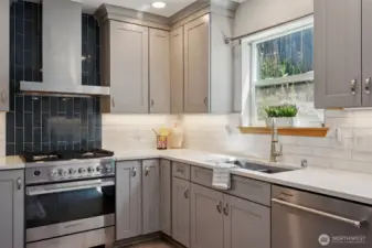 Look! Just LOOK at that stove. And the tile backdrop is so pretty
