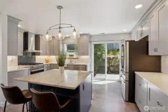 I can't say enough about this custom kitchen. Beautiful shaker cabinets, Fisher&Paykel range, drawer microwave, it's all brand new and ready for you
