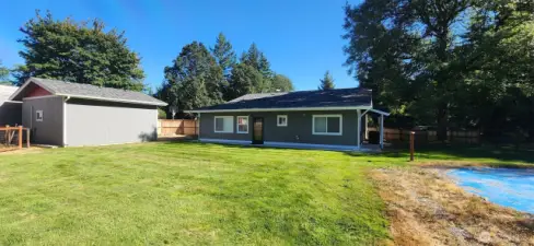 Secondary fenced in back yard with level pool pad