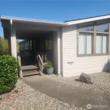 Left side front door covered entry.