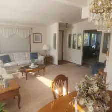 Dining room back across toward front door entry.
