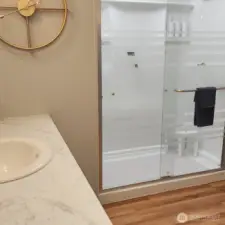 Updated primary bathroom newer walk in shower.