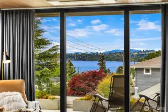 Primary bedroom views looking west. There's also views of Mount Rainier and downtown Bellevue to South