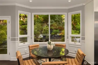 The dining area off the kitchen feels like eating in the garden, which is also an option on the back patio!