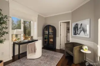 Bedroom #4 / guest suite / additional den is on the main floor and has an attached bathroom with a shower.