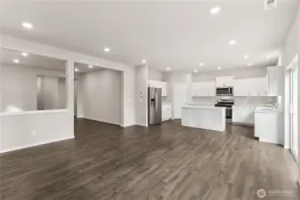 Large great room and a huge dining area that will accommodate a table for ten. Photos are representative only and may display different color packages and/or upgrades.