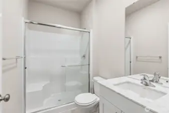 Full bathroom featuring a tub and shower combo. Photos are representative only and may display different color packages and/or upgrades.