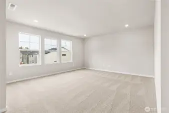 Spacious primary bedroom. Photos are representative only and may display different color packages and/or upgrades.