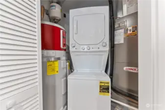 Laundry is closeted right off of the kitchen. Easy access to water heater and furnace.