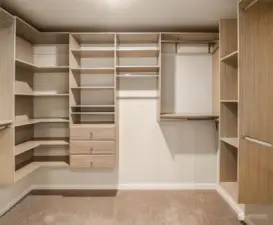 Primary walk-in closet with new built-ins.