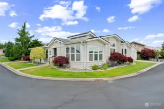 Corner lot, with living/entertaining area to the shady, covered patio to the east east