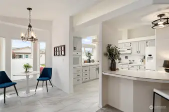 Kitchen hardware updated, easy care laminate floor from laundry entry, through kitchen, cabinets professionally painted in soft dove grey.