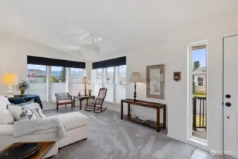 Entry to open, bright living room.  Note the highlighted views of mountains to south and west.