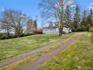 The long driveway provides privacy and lots of options for future enjoyment.