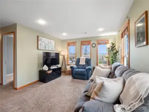 A bright and spacious living area with elegant finishes and natural light pouring in.