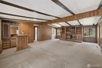 Fully functioning wet bar perfect for entertaining. Lots of built-ins here too.