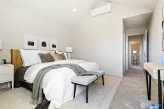 Another angle of the luxe primary suite—airy, peaceful, and spacious with direct access to your walk-in closet and ensuite bath.