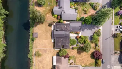 Soaring view of the home and amazing neighborhood that lines the river.