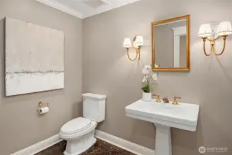 Main floor powder room is simple and elegant.