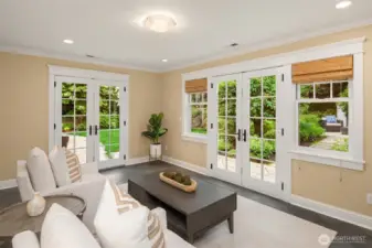 The sun room offers massive flexibility - opening up to the outside for summer entertainment, or your personal gym.  Heated tile floors!