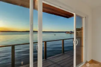 Large slider door opens up to the water as if you're on cruise ship.