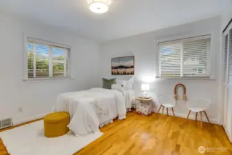 Bedroom located on south (back) side of the home. spacious, clean, well lit with standard size closet.