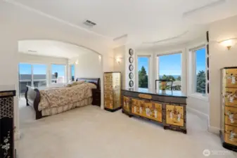 Upstairs Primary Bedroom with Views and lounge access. House has speakers that can be connected to a receiver in the primary