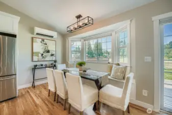 The dining area has a window seat with under storage.