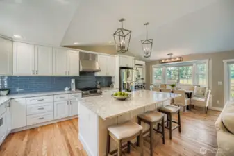 The kitchen has a 4 ft by 8 ft island with seating and storage.