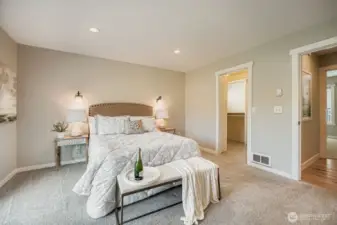 Enjoy the luxury of a walk-in closet with organizers.