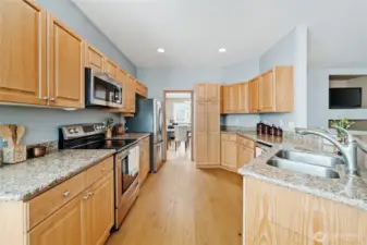 Great kitchen layout with plenty of storage, bull-nosed countertops, and undermount sink.