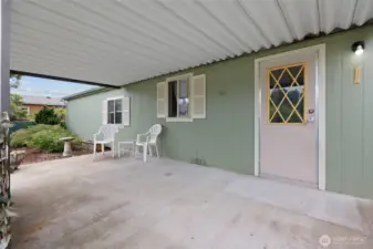 Windows are the kitchen & dining space