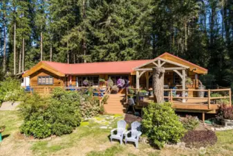On the west side of the home is a large deck, with a large pavilion cover on the SW corner - this deck is fabulous!