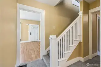 The hallway in Unit A makes moving from room to room a breeze. From the living room, it loops past the laundry room and full bathroom, then flows right into the den. This smooth layout ensures you’re never far from what you need, creating a comfortable, connected space throughout the home.