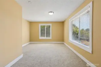 Bedroom #2 in Unit B with backyard open air views.