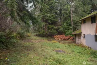 Back 2.5 acres past the house is private and wooded.